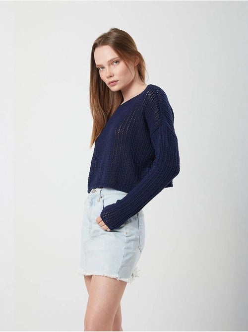 Top in maglia crop con scollo a barca e lavorazione traforata mixray - Kiabi Top in maglia crop con scollo a barca e lavorazione traforata mixray - Kiabi