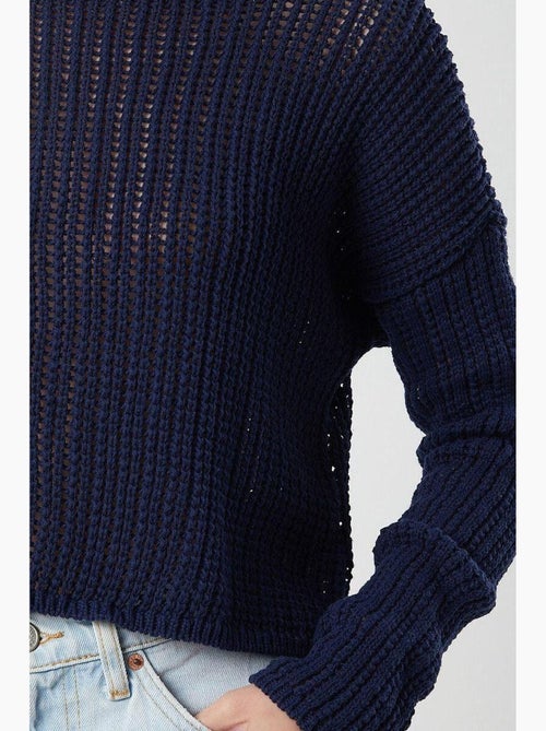 Top in maglia crop con scollo a barca e lavorazione traforata mixray - Kiabi Top in maglia crop con scollo a barca e lavorazione traforata mixray - Kiabi