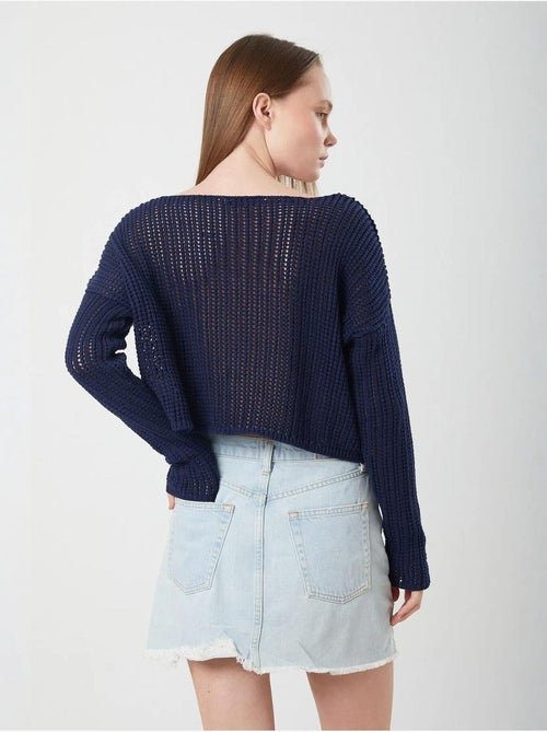 Top in maglia crop con scollo a barca e lavorazione traforata mixray - Kiabi Top in maglia crop con scollo a barca e lavorazione traforata mixray - Kiabi