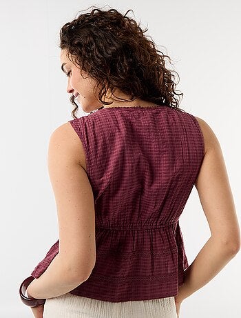 Top in maglia traforata senza maniche