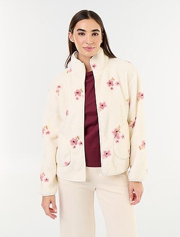 Top in pile con zip e fantasia