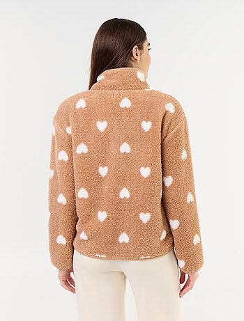 Top in pile con zip e fantasia