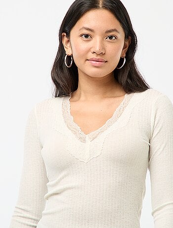 Top in pizzo a maniche lunghe