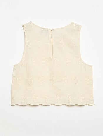 Top senza maniche con ricamo all over
