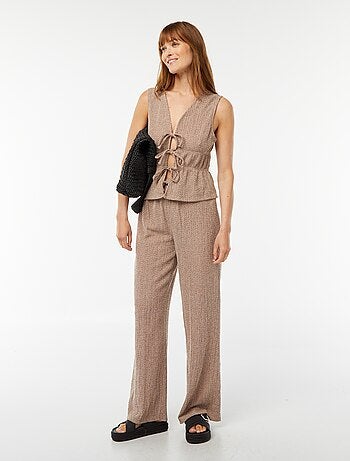 Top senza maniche in tessuto goffrato con cordoncini da annodare