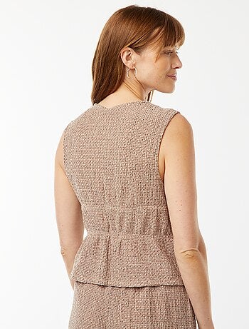 Top senza maniche in tessuto goffrato con cordoncini da annodare