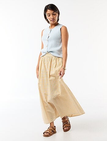 Top smanicato con bottoni dorati