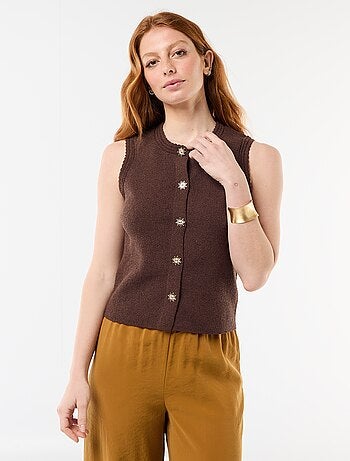 Top smanicato con bottoni dorati