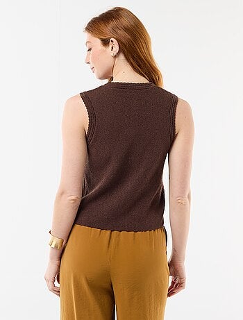 Top smanicato con bottoni dorati