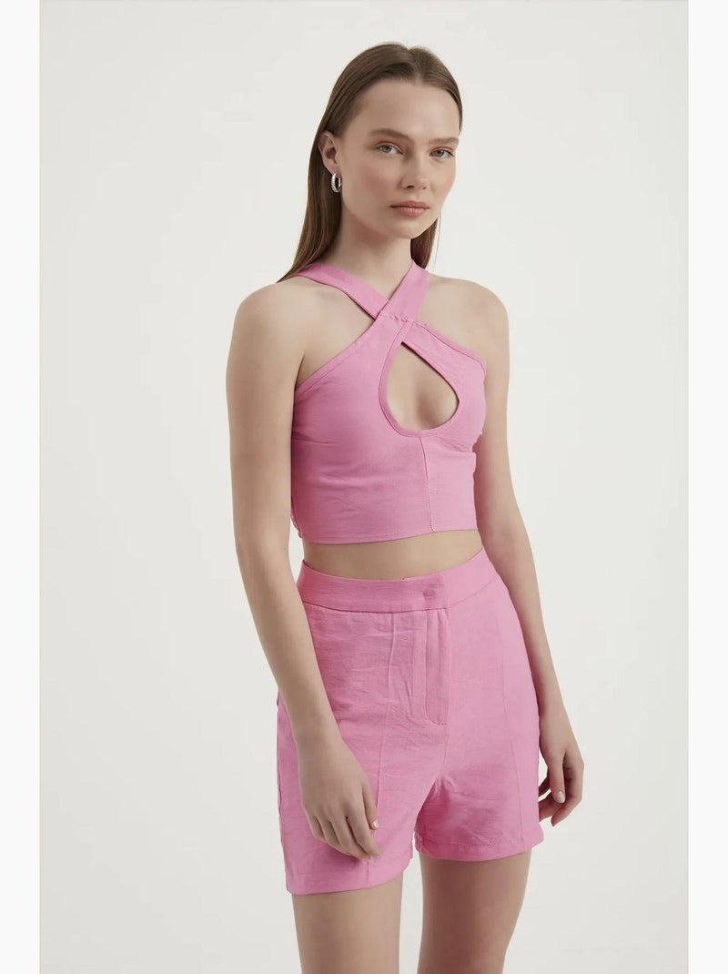 Top smanicato halter con cut out corto hiccup Rosa - Kiabi