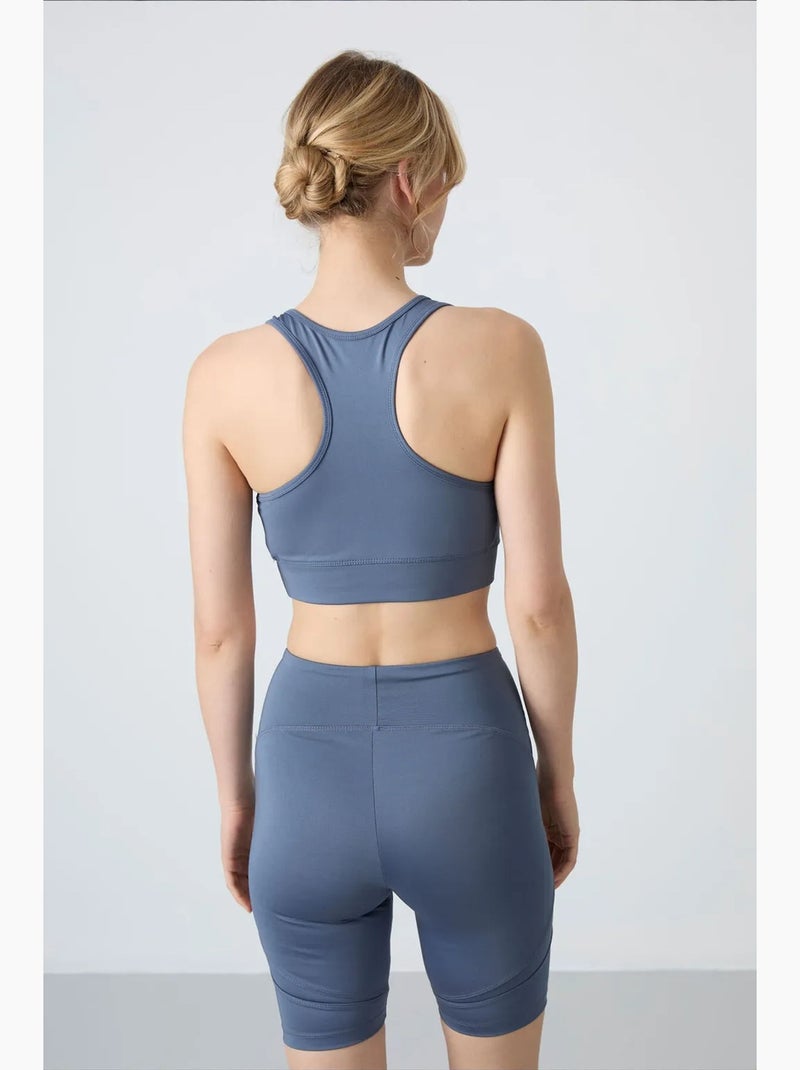 Top sportivo corto aderente senza maniche tommy Blu marino - Kiabi
