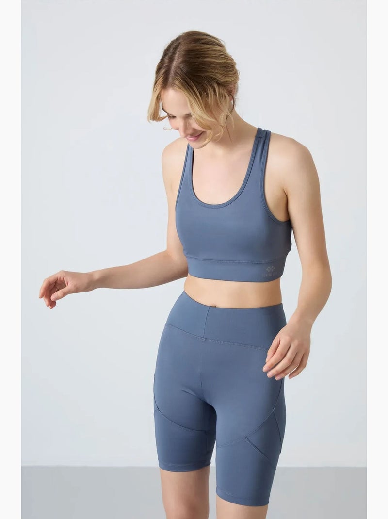 Top sportivo corto aderente senza maniche tommy Blu - Kiabi