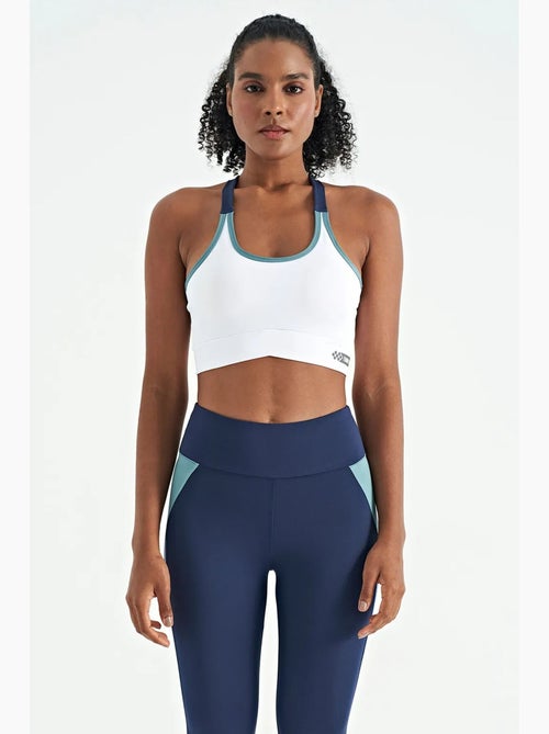 Top sportivo crop aderente senza maniche tommy - Kiabi