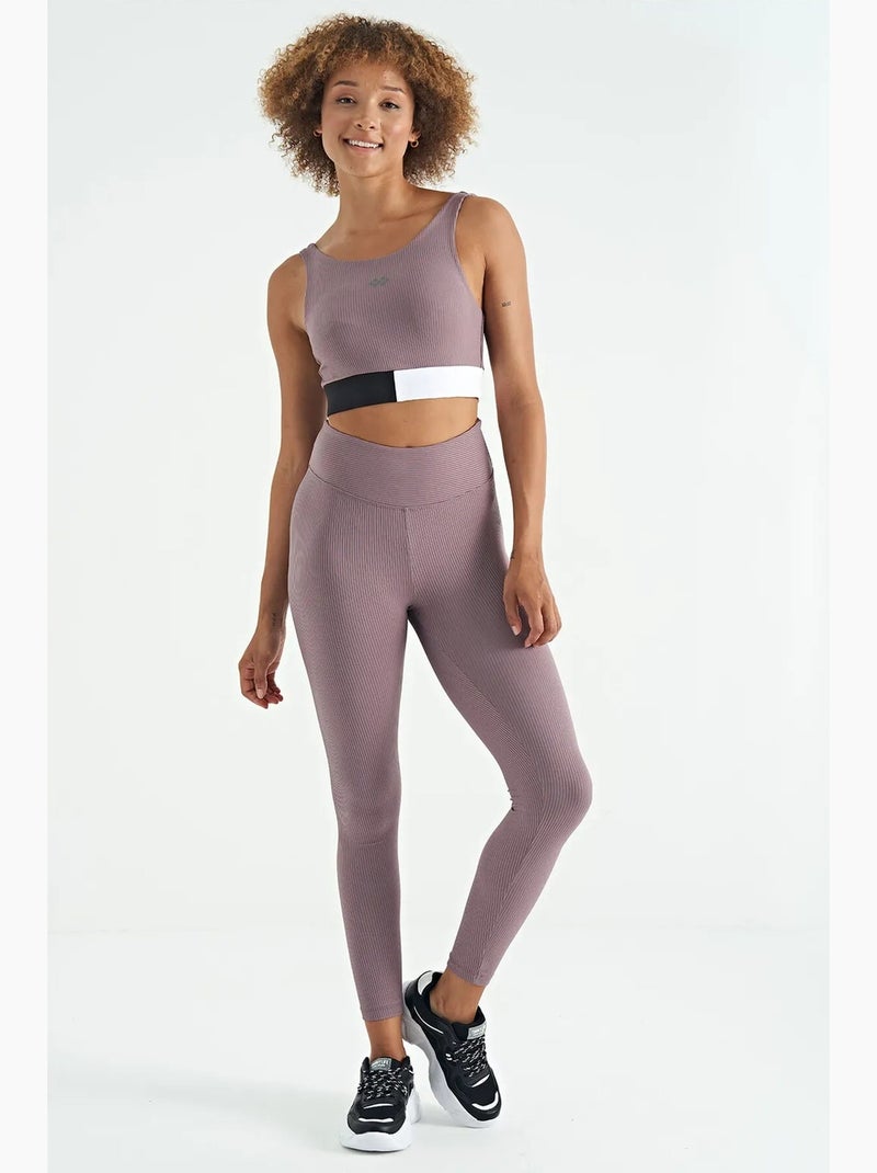 Top sportivo crop senza maniche color block tommy Rosa antico - Kiabi