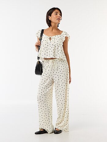 Top stampato in maglia stropicciata