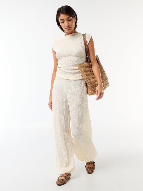 Top stretch asimmetrico a tinta unita senza maniche - Kiabi