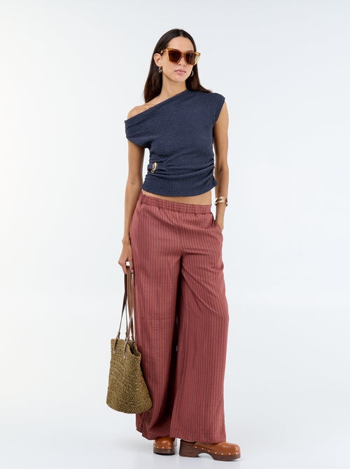 Top stretch asimmetrico a tinta unita senza maniche - Kiabi