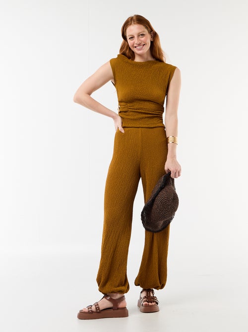 Top stretch asimmetrico a tinta unita senza maniche - Kiabi