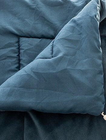 Trapunta in velluto con nappe