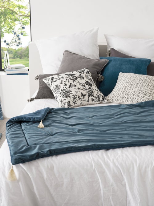 Trapunta in velluto con nappe - Kiabi Trapunta in velluto con nappe - Kiabi