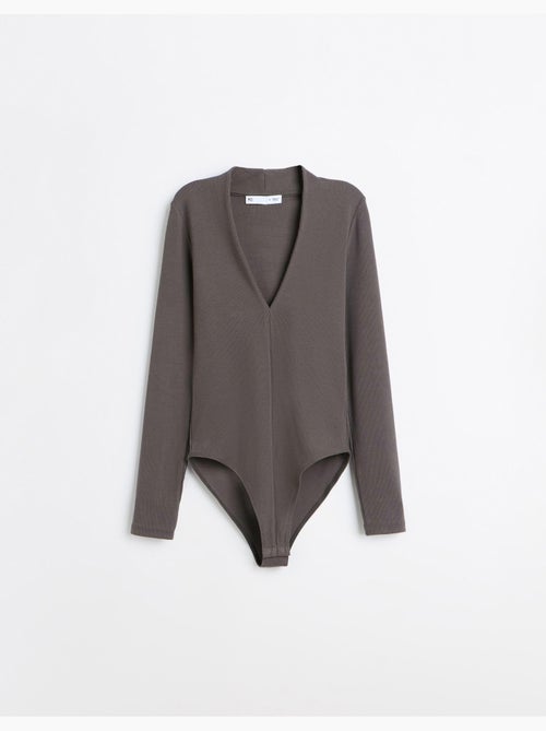 Tuta a maniche lunghe, mo fashion - Kiabi Tuta a maniche lunghe, mo fashion - Kiabi