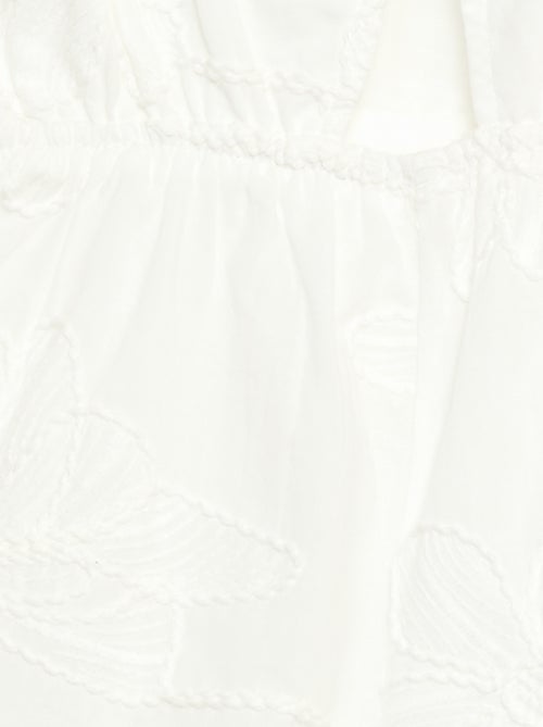 Tuta corta con grandi fiori ricamati - Kiabi