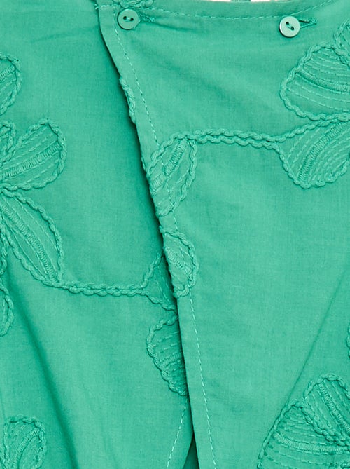 Tuta corta con grandi fiori ricamati - Kiabi