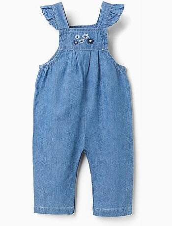 Tuta in denim con fiori ricamati
