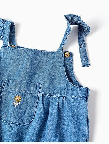 Tuta in denim senza maniche con fiore ricamato