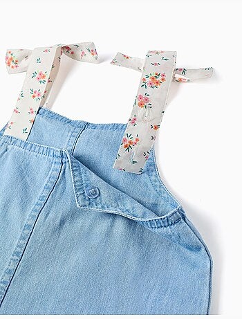 Tuta in denim senza maniche con spalline floreali