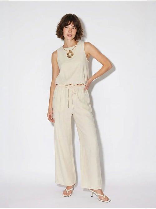 Tuta lunga in cotone a gamba ampia senza maniche lucci - Kiabi Tuta lunga in cotone a gamba ampia senza maniche lucci - Kiabi