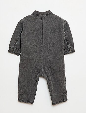 Tuta lunga in denim con apertura abbottonata