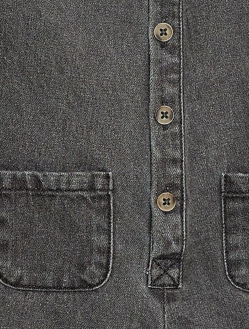 Tuta lunga in denim con apertura abbottonata