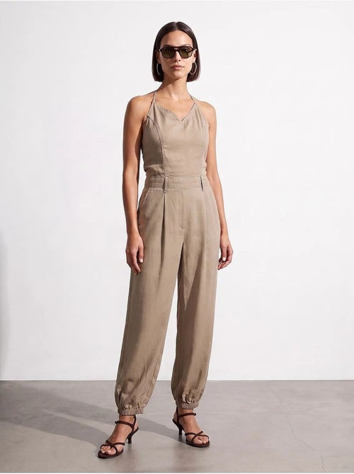 Tuta lunga in tencel con scollo halter dilvin - Kiabi Tuta lunga in tencel con scollo halter dilvin - Kiabi