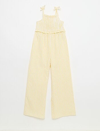 Tuta pantalone con bretelle