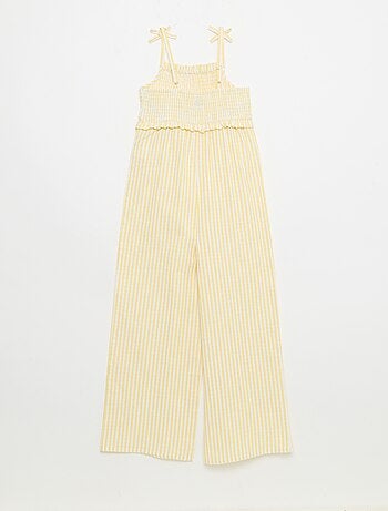 Tuta pantalone con bretelle