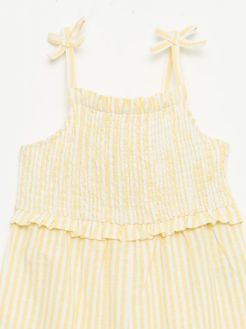 Tuta pantalone con bretelle - Kiabi