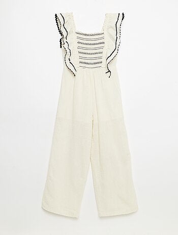 Tuta pantalone con volant