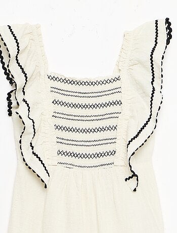 Tuta pantalone con volant