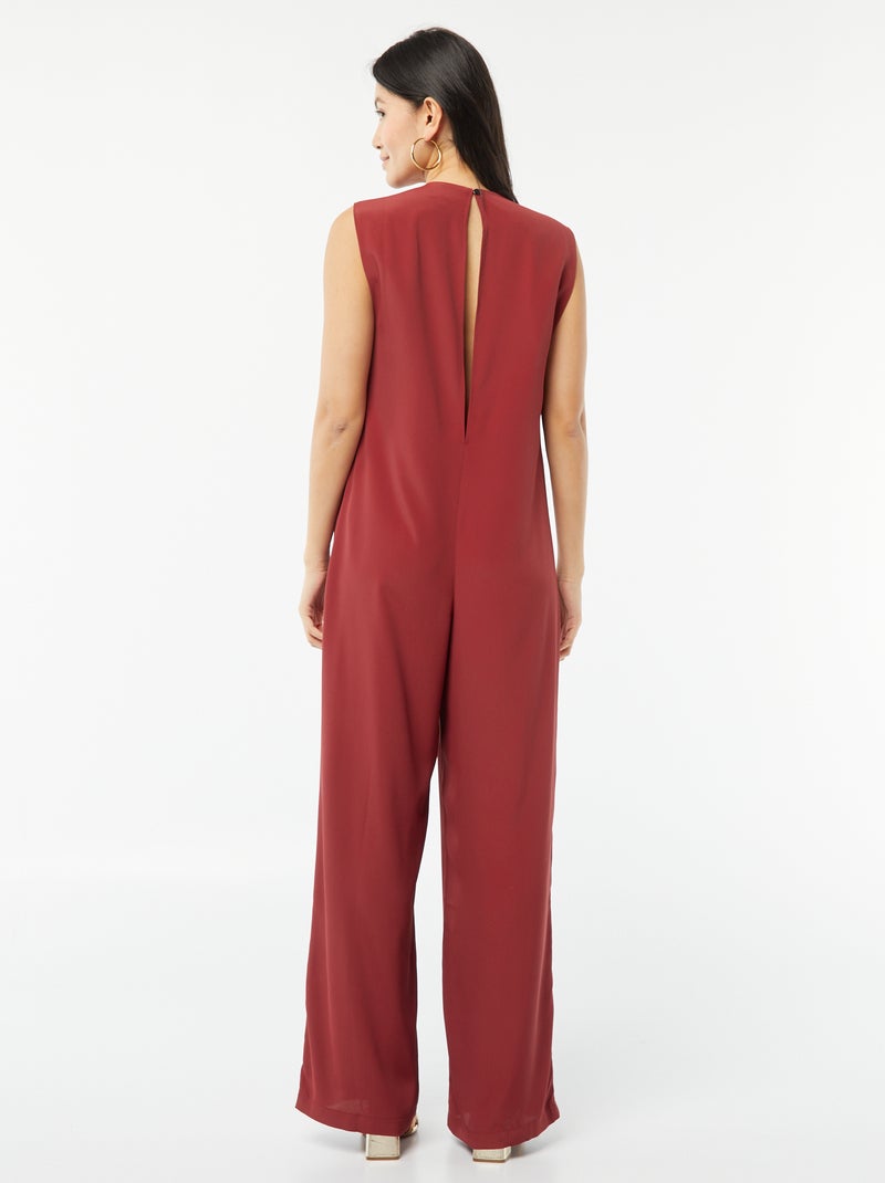DESIGN - Tuta jumpsuit accollata nera senza maniche con cut-out