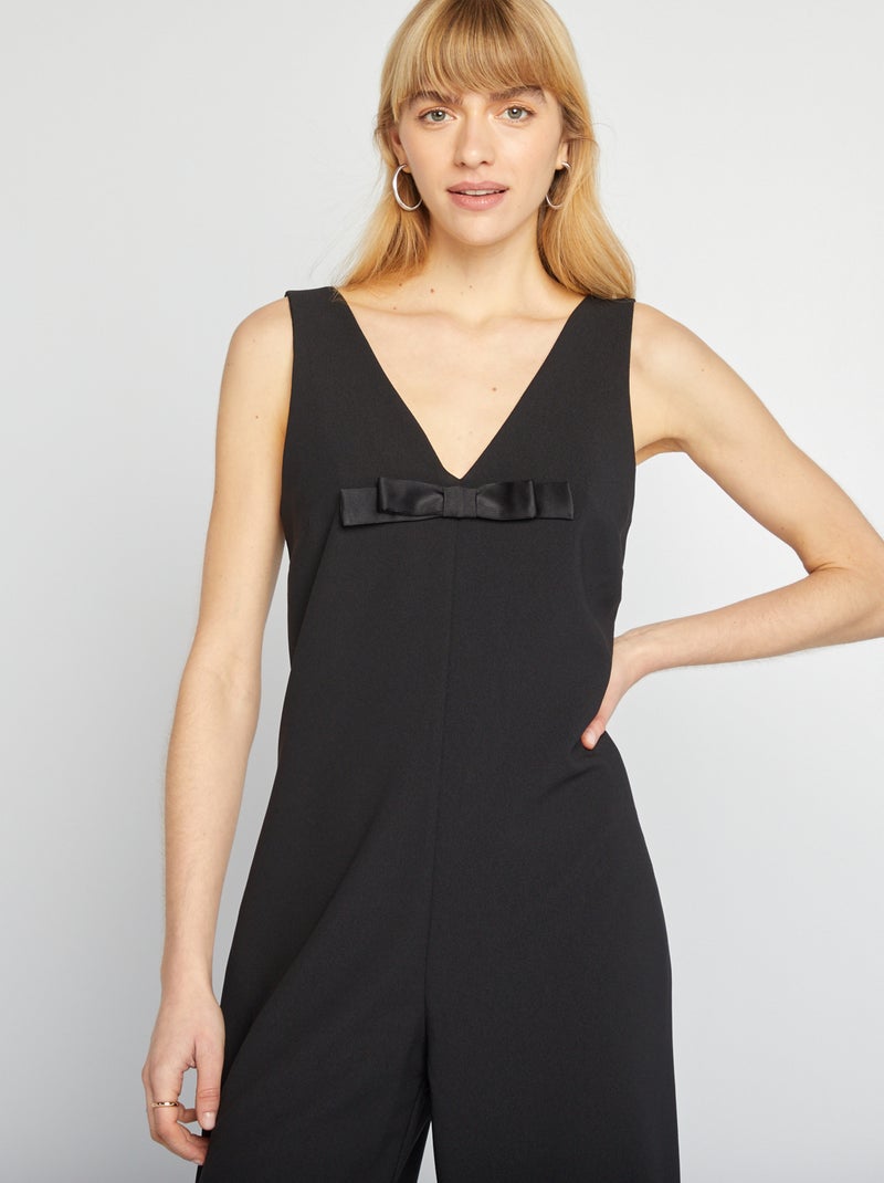 Tuta pantaloni con fiocco fantasia nero - Kiabi