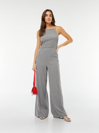 Tuta wide leg con spalline