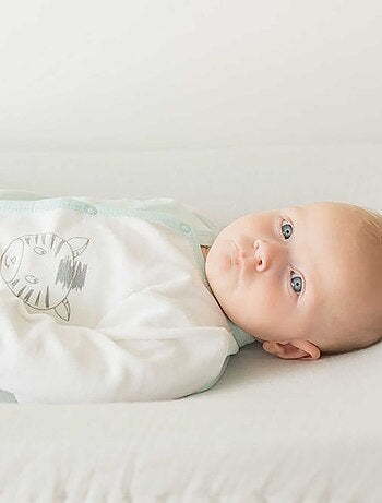 Tutina con apertura frontale motivo zebra