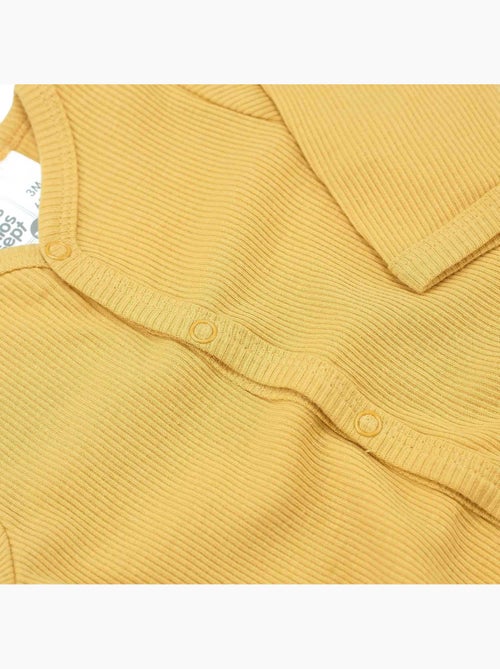 Tutina in maglia a costine di cotone - Kiabi Tutina in maglia a costine di cotone - Kiabi