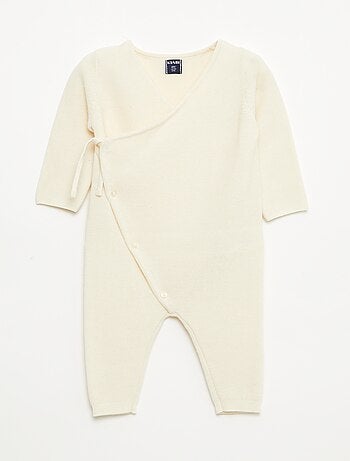 Tutina in maglia con apertura a portafoglio