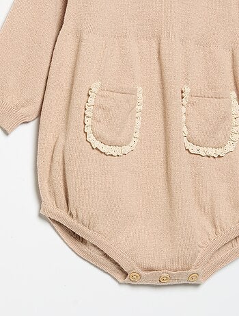 Tutina in maglia con colletto e tasche fantasia