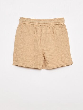 Un completo due pezzi camicia + pantaloncino