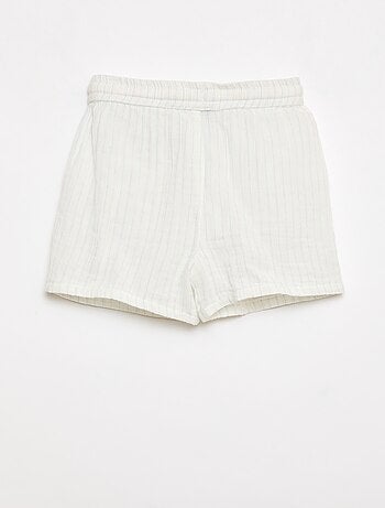 Un completo due pezzi camicia + pantaloncino