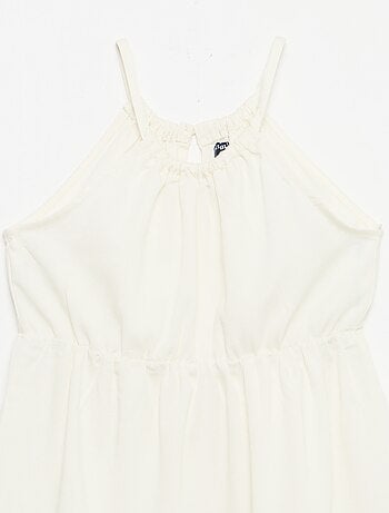 Vestito a tinta unita con spalline e balze