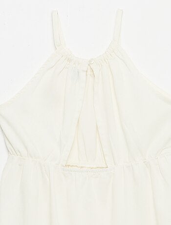 Vestito a tinta unita con spalline e balze